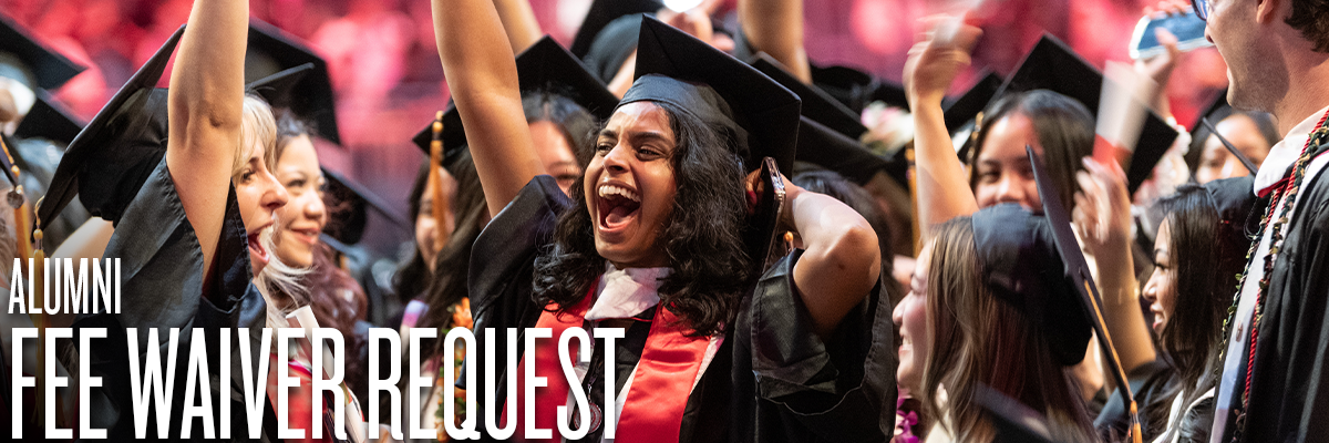 "ALUMNI APPLICATION FEE WAIVER REQUEST" in front of a joyful assembly of graduates in caps and gowns, proudly commemorating their educational milestones in a festive setting.